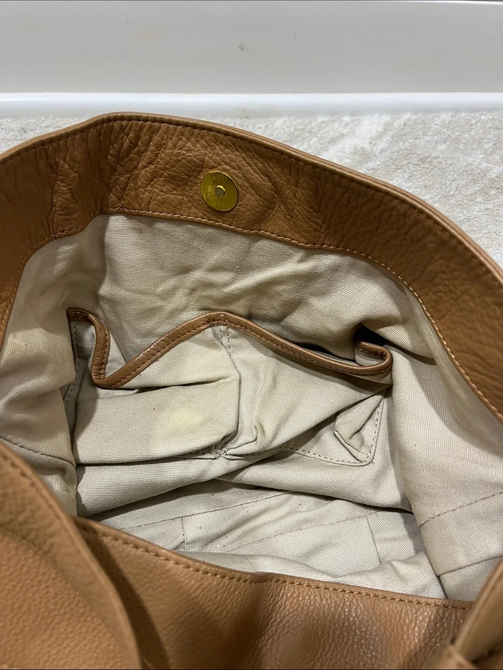 Tory Burch tan pebble leather handbag